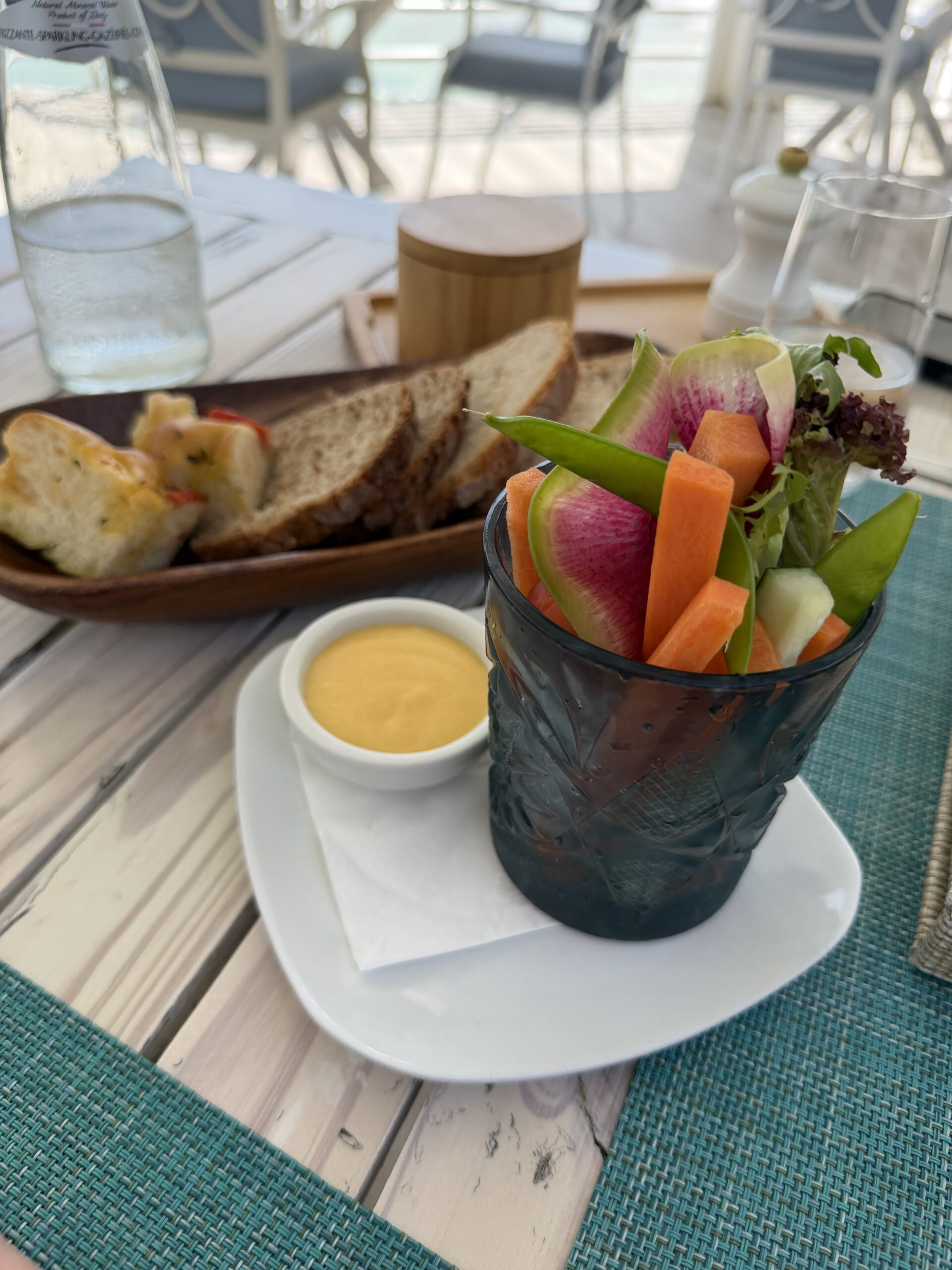 Dishes of food on a table at Eden Roc Cap Cana